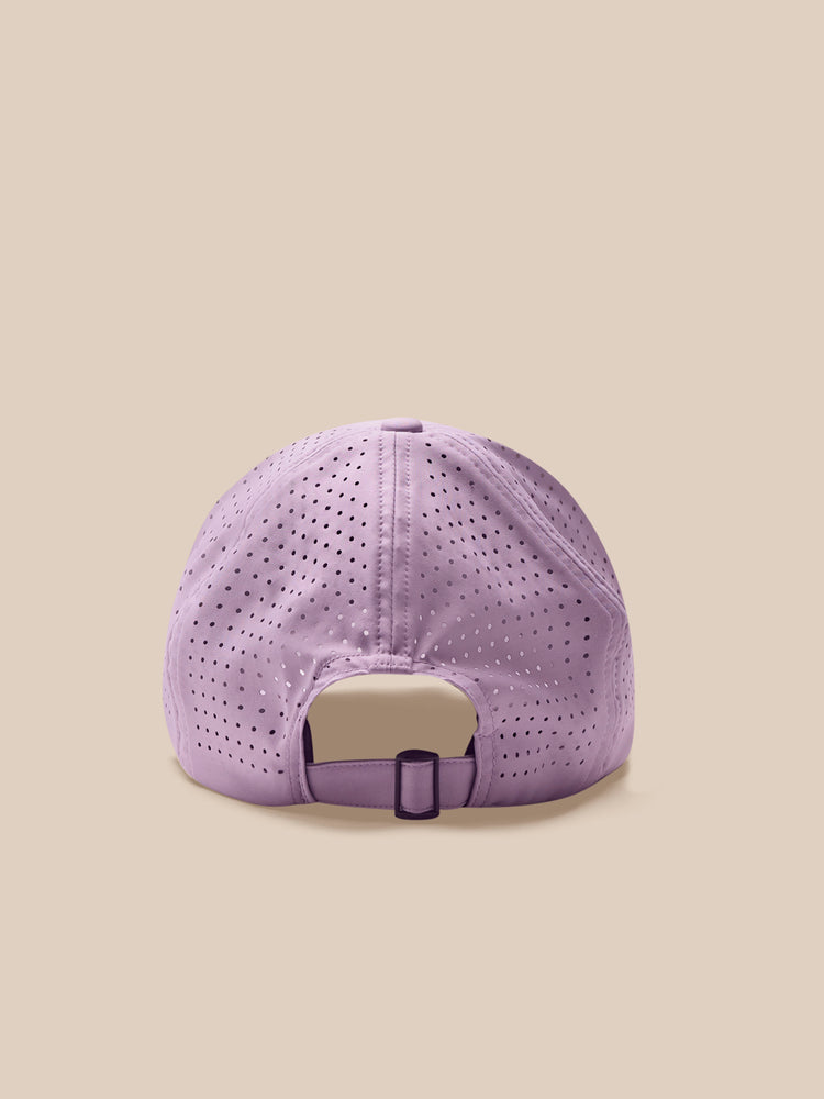 Purple baseball cap with a beige background