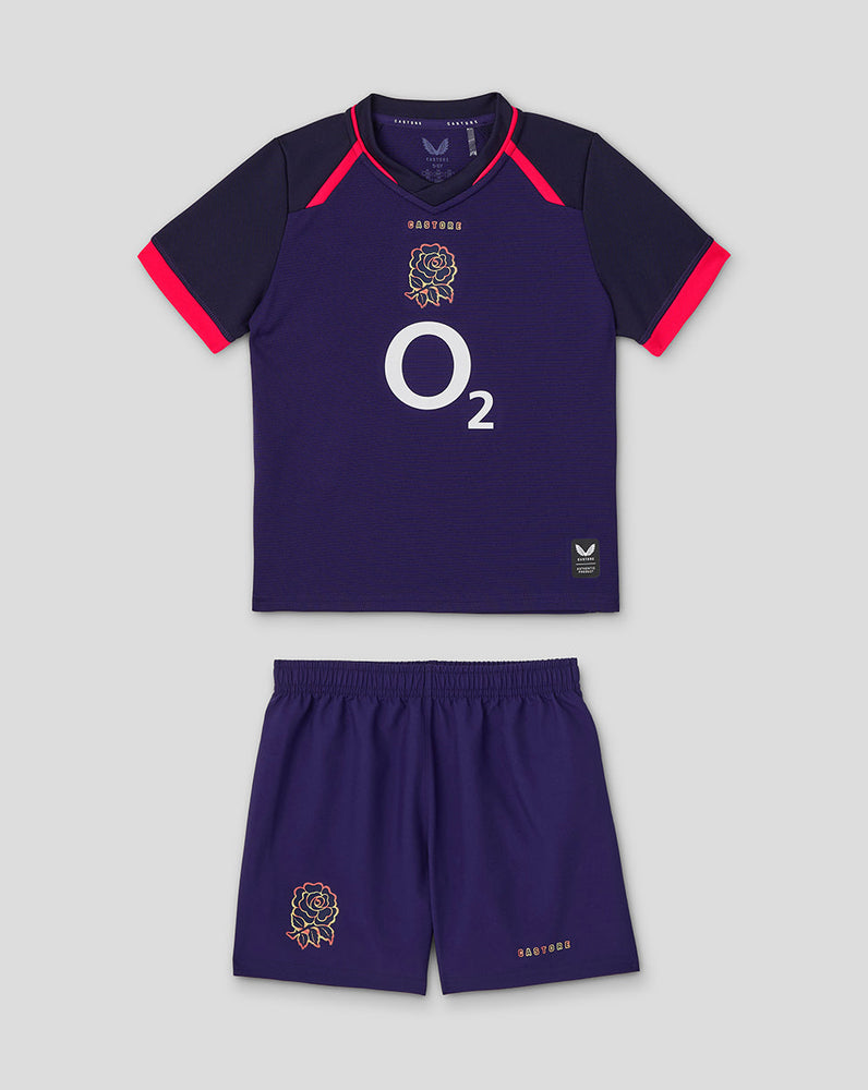 Navy sports outfit with red accents on a light gray background