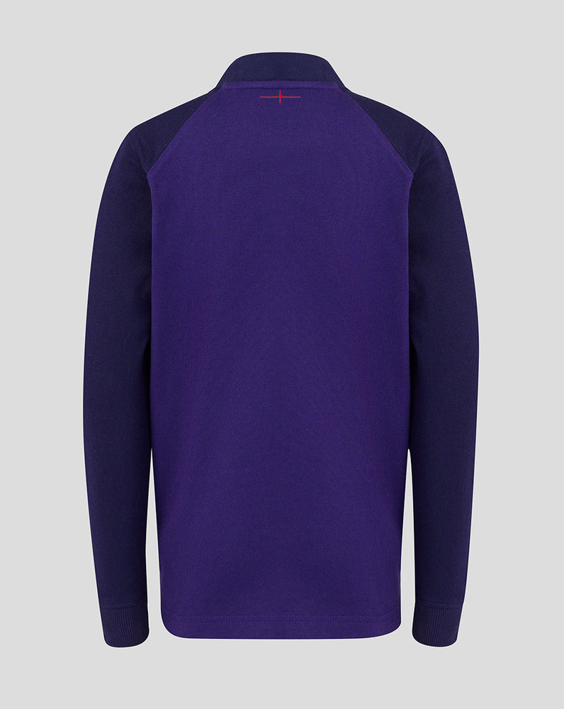 Purple long-sleeve shirt with a small red logo on the chest against a light gray background