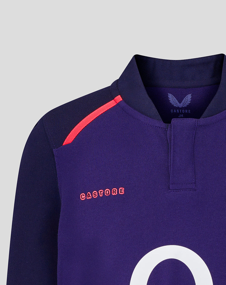 Navy rugby jersey with red accents and 'CASTORE' branding on a light gray background