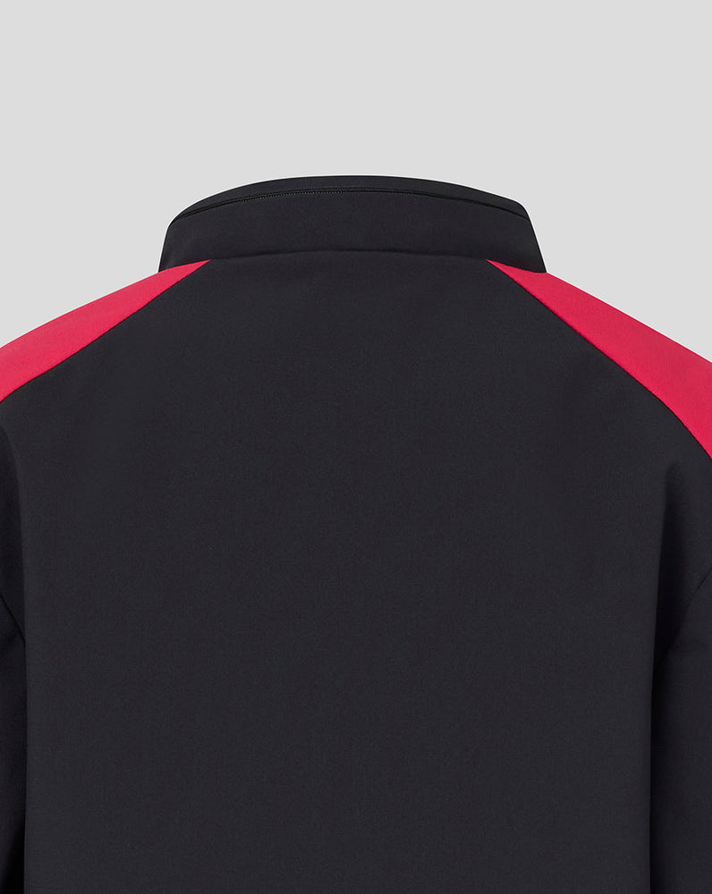 Black jacket with red shoulders on a light gray background