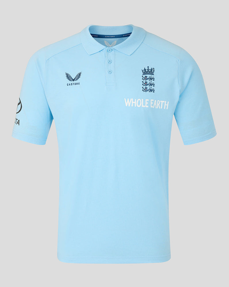 Light blue polo shirt with multiple logos on a light gray background