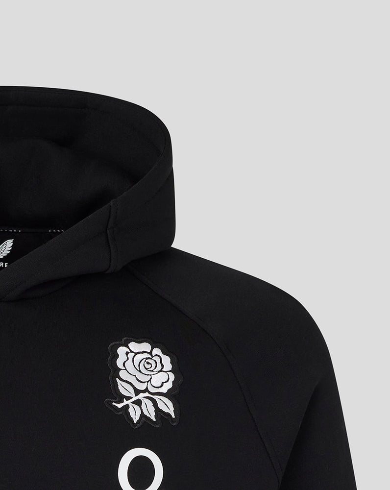 Black hoodie with white rose emblem on a light gray background