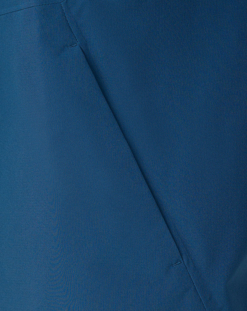 Close-up of blue fabric with a visible seam
