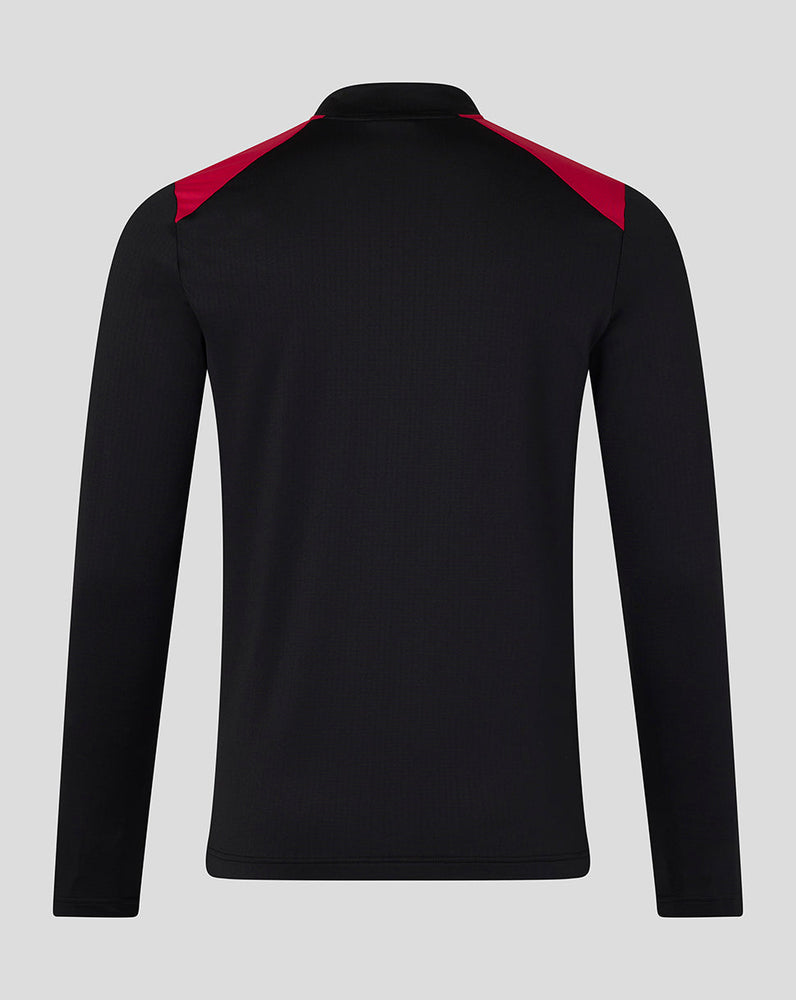 Black long-sleeve shirt with red accents on a gray background