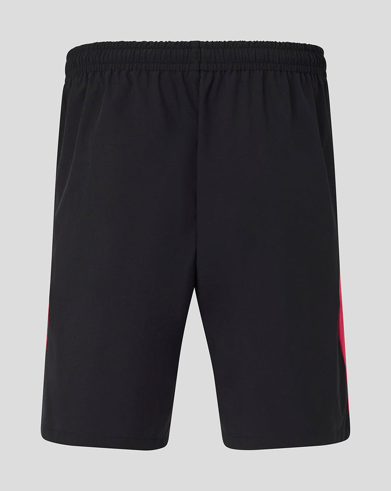 Black shorts with a red stripe on a light gray background