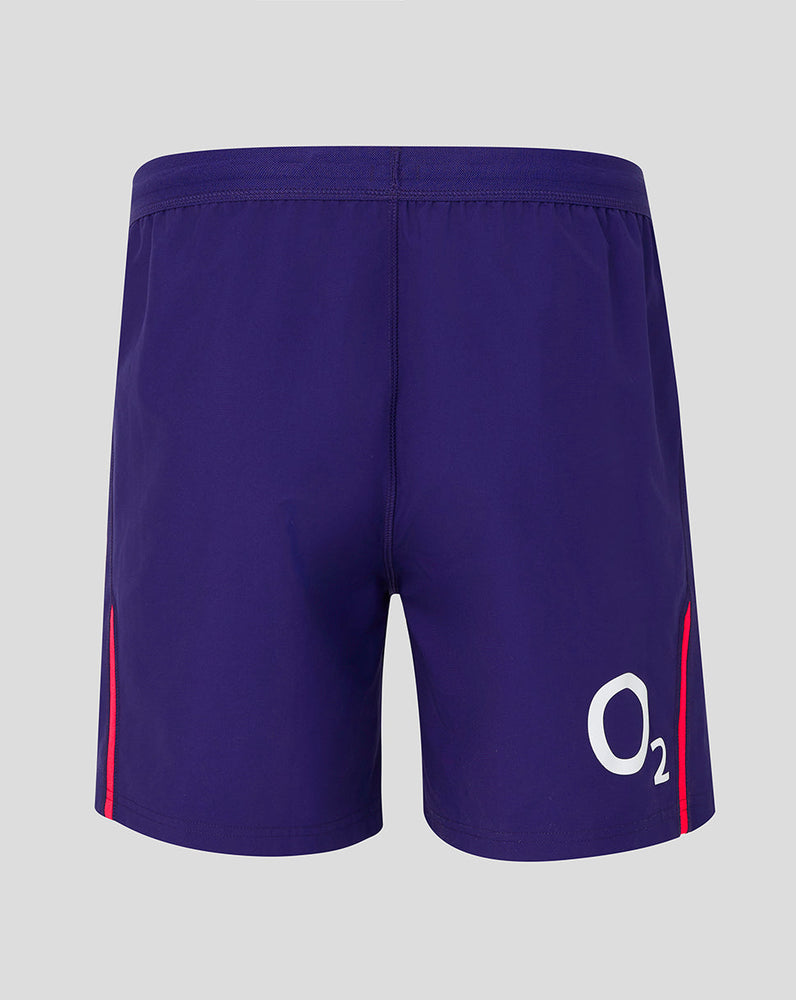 Purple shorts with a logo on a gray background