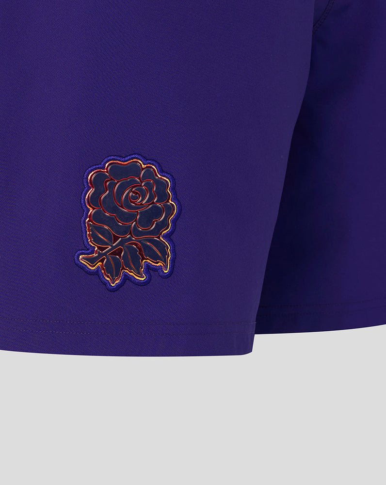 Navy blue fabric with a rose emblem on a white background