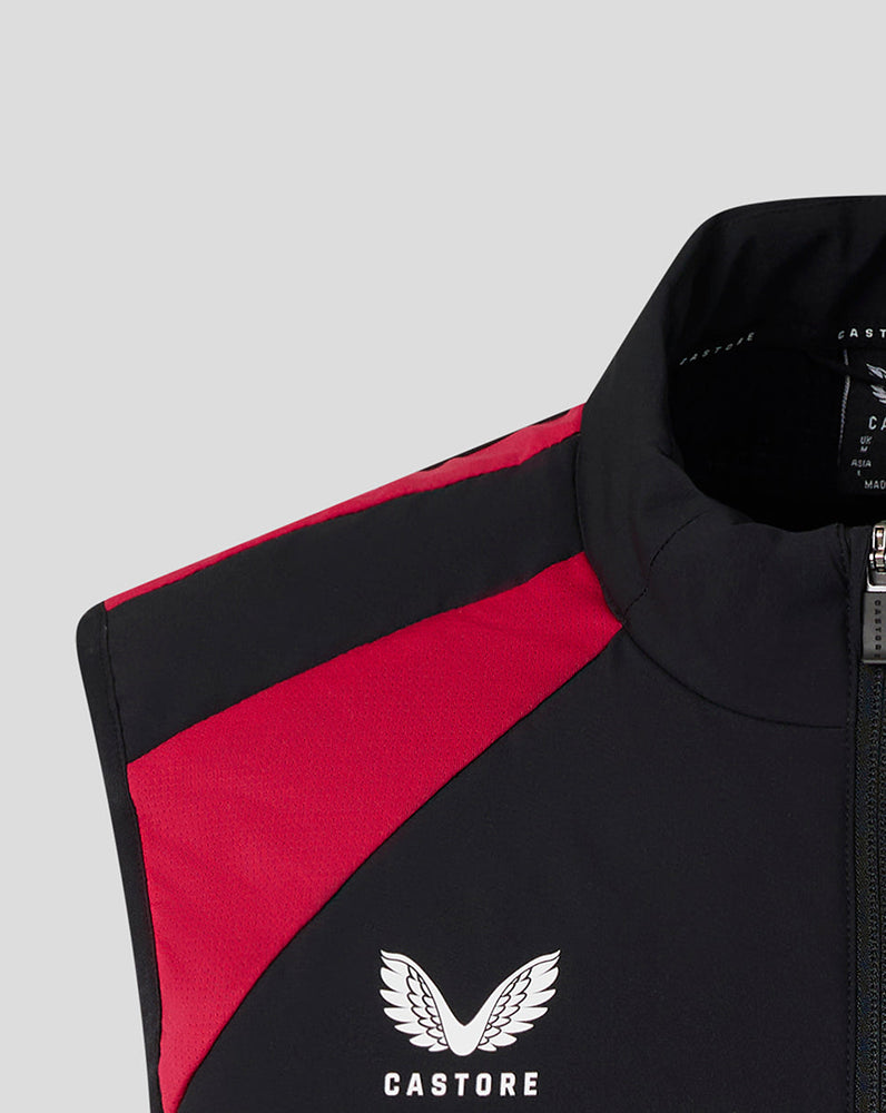 Black and red jacket with Castore logo on a light gray background