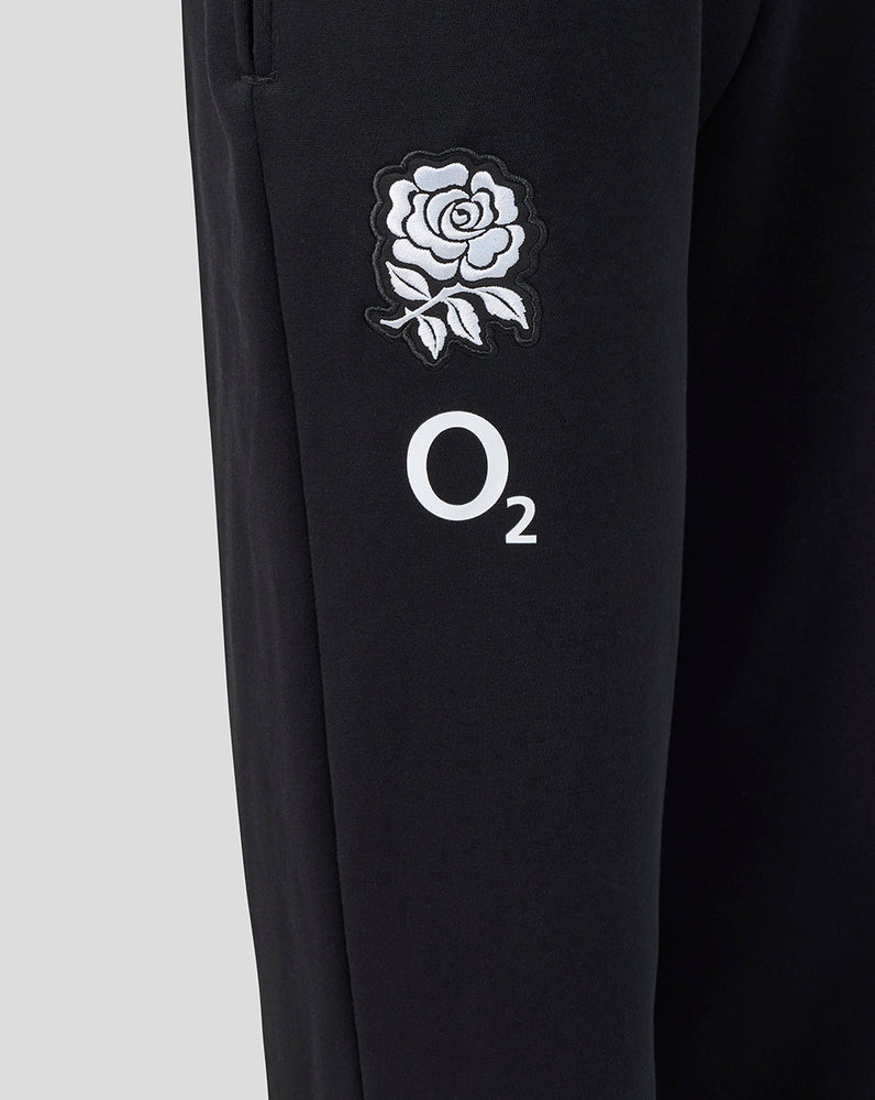 Black pants with white rose emblem and 'O2' logo on a light gray background