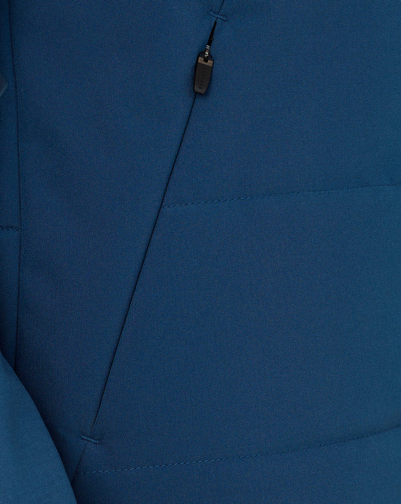 Close-up of a blue jacket with a zipper detail