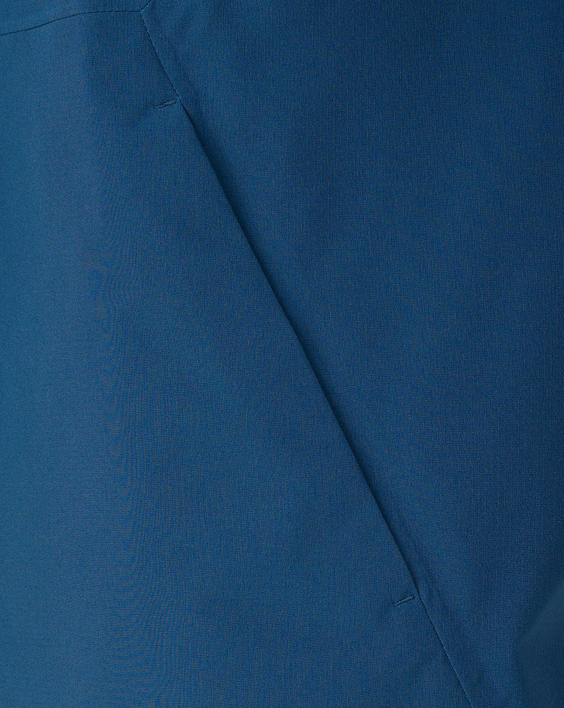 Close-up of blue fabric with a visible seam