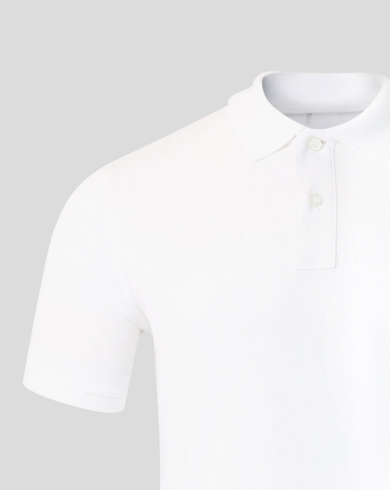 White polo shirt on a light gray background