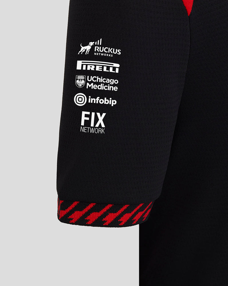 Black sleeve with brand logos on a gray background