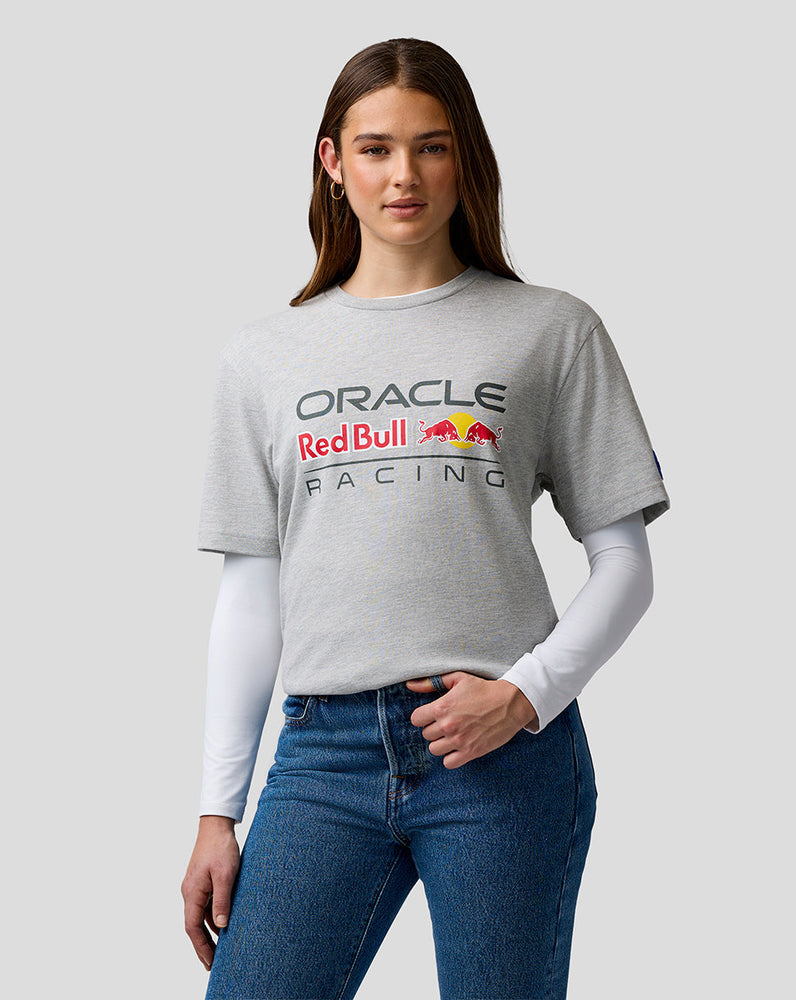 Person wearing a gray 'Oracle Red Bull Racing' t-shirt on a plain background